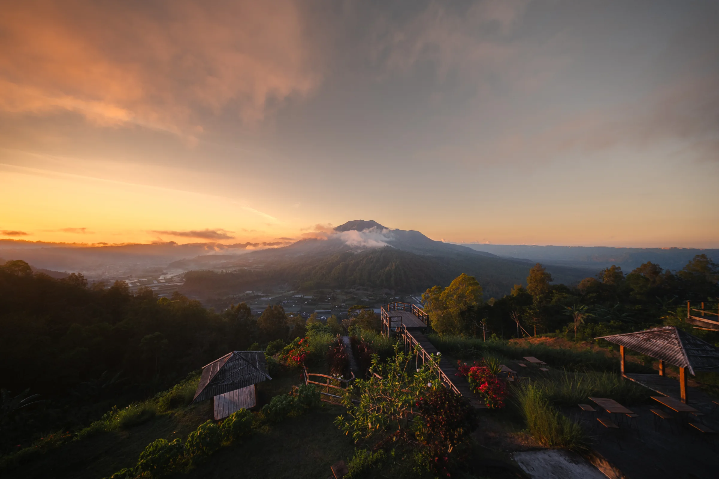Sunrise over a volcanic mountain landscape in Bali